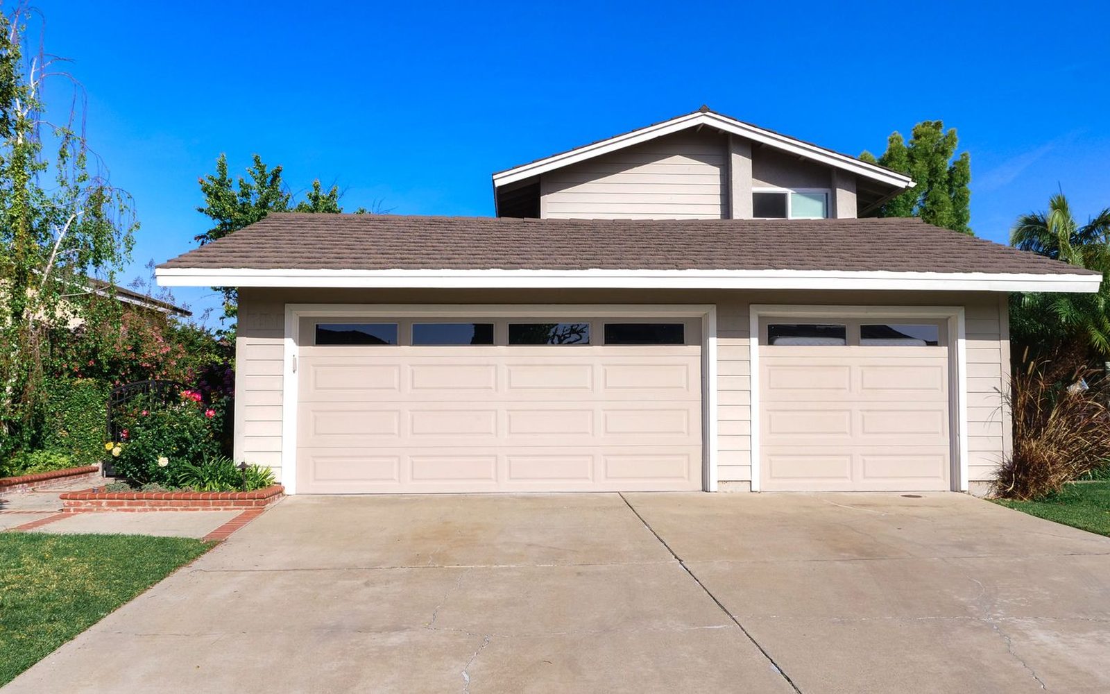 Home exterior with a double garage door